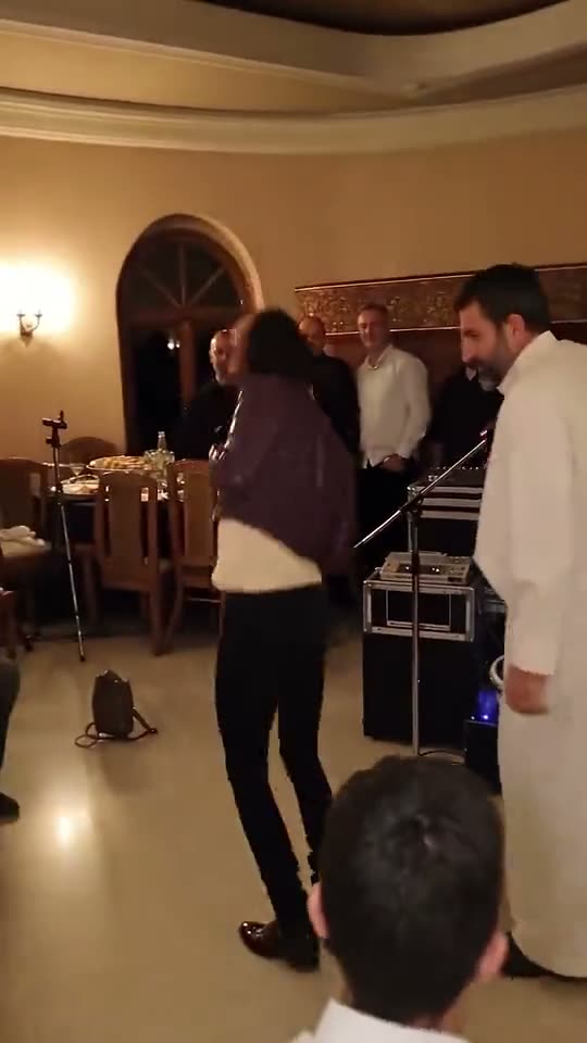 Frame from a Party Viral Dance AI video: the dancer jumps on the open floor